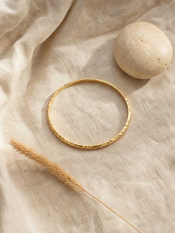Hammered Brass Bangle in gold-tone