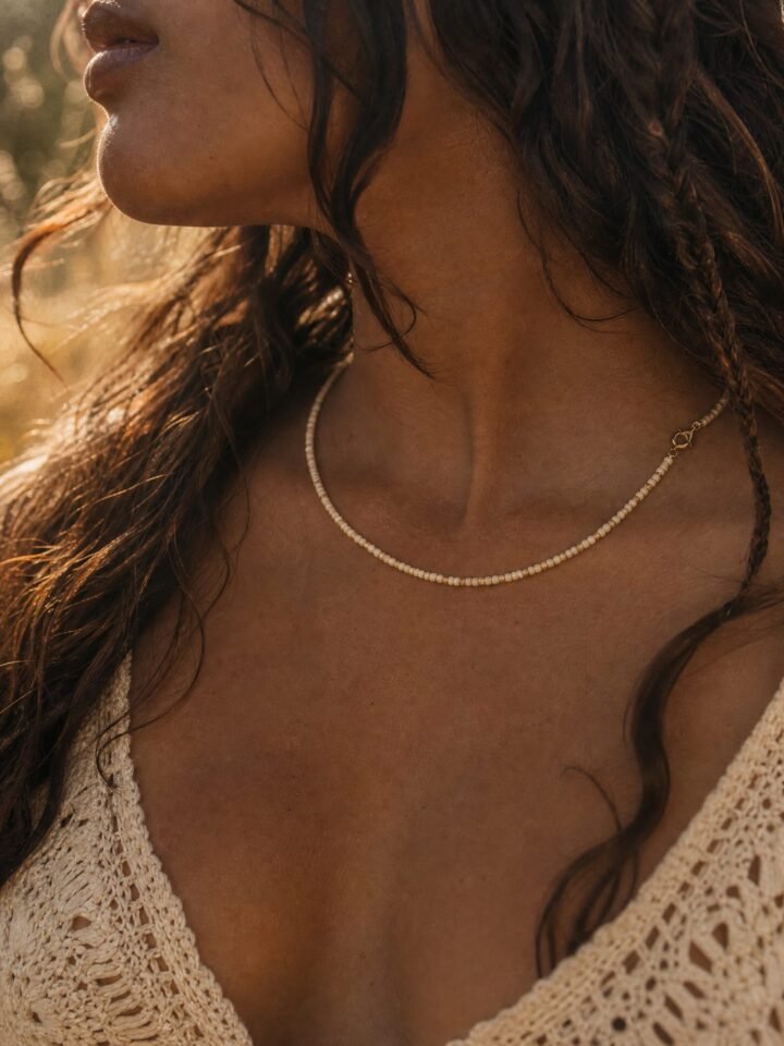 Sandpiper Seed Bead Choker worn in a summer meadow