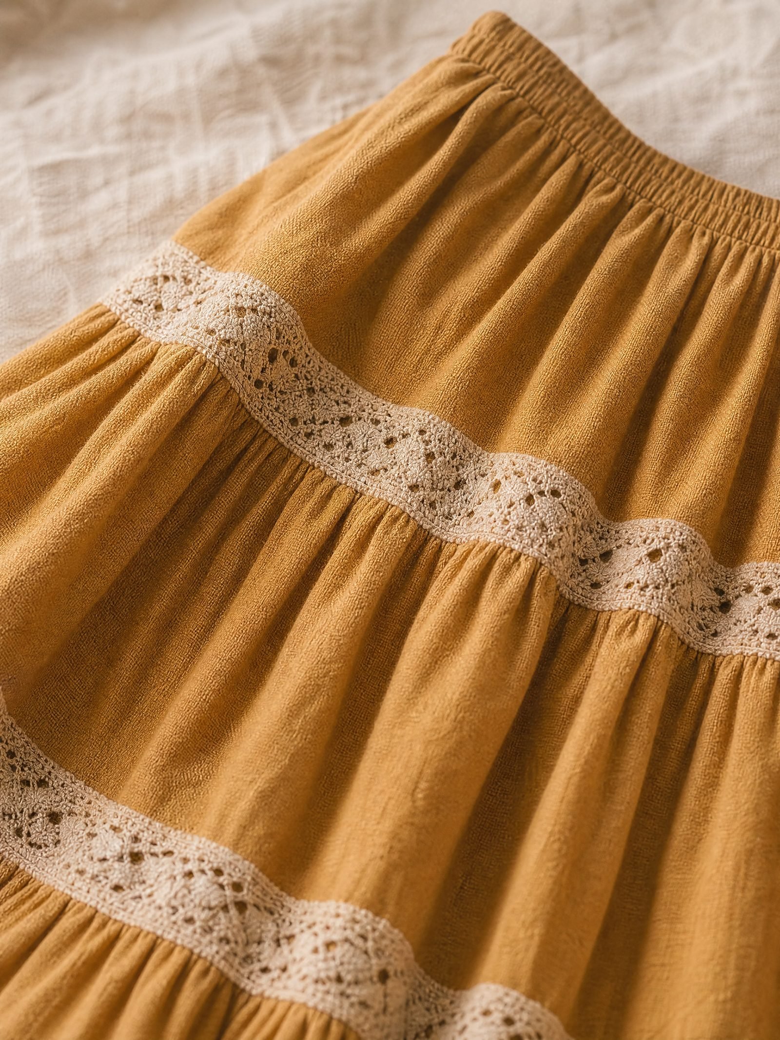 Close-up detail of the Goldenrod Lace-Trim Tiered Maxi